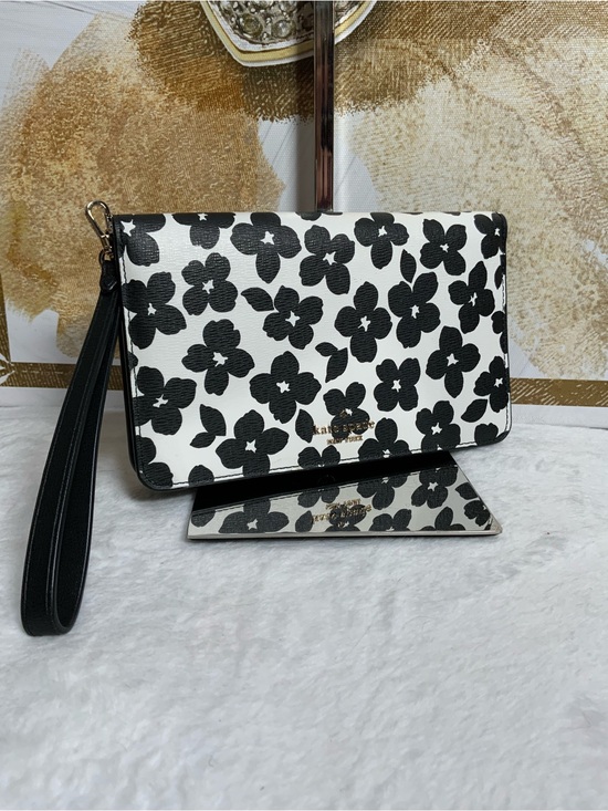 kate spade Handbags - kate spade Black and White Floral Wristlet Clutch
